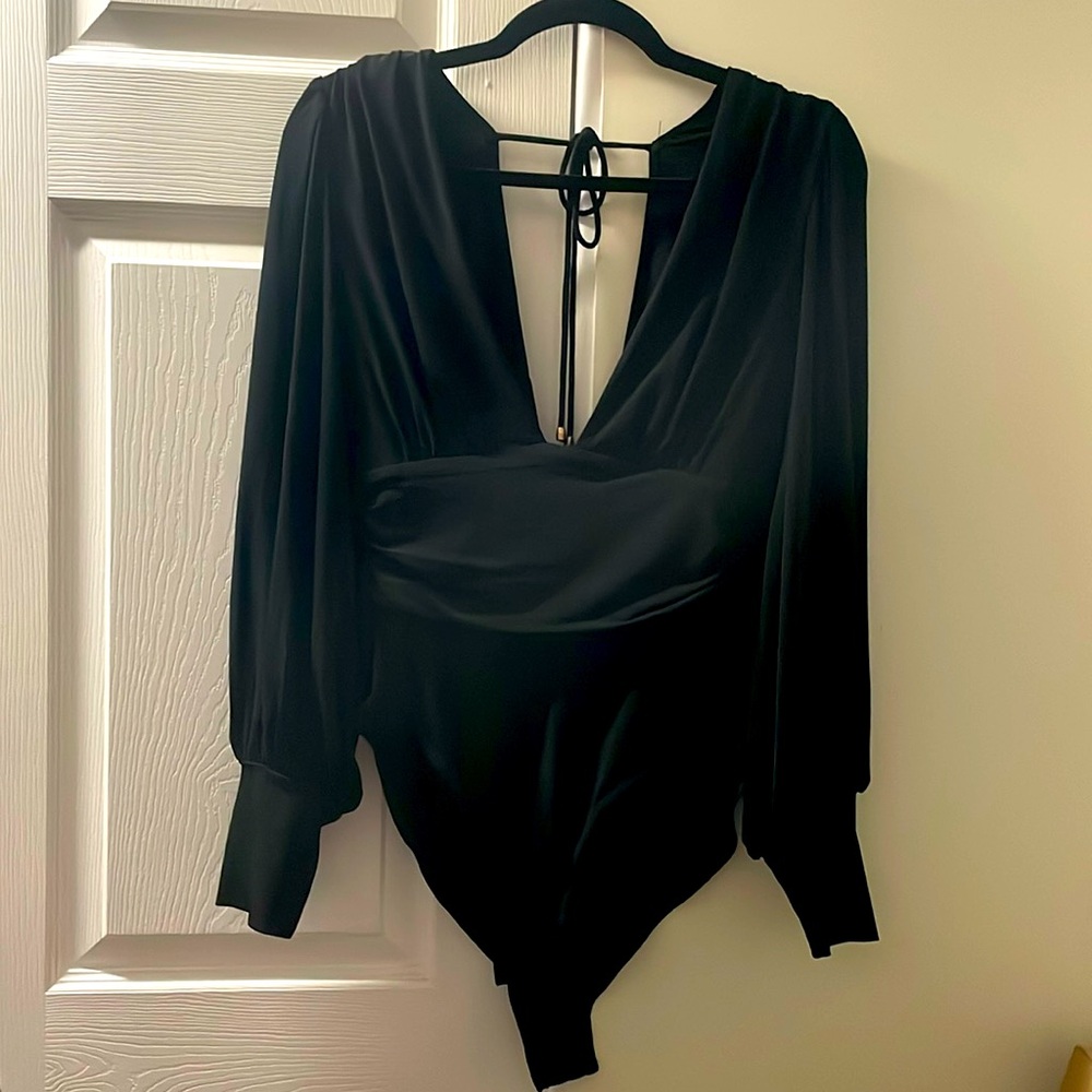 Black plunge bodysuit, new with tags.